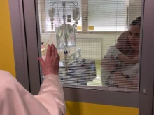 Pope Francis blesses a child in the Department of Pediatric Oncology at the Gemelli Hospital in Rome, July 13, 2021.